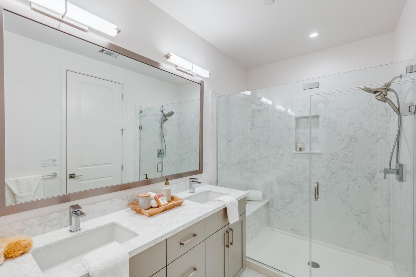 309 Marquetta Circle Mountain View, CA 94043 - Photo 19 of 34 a bathroom with a sink double vanity granite tub shower and a mirror