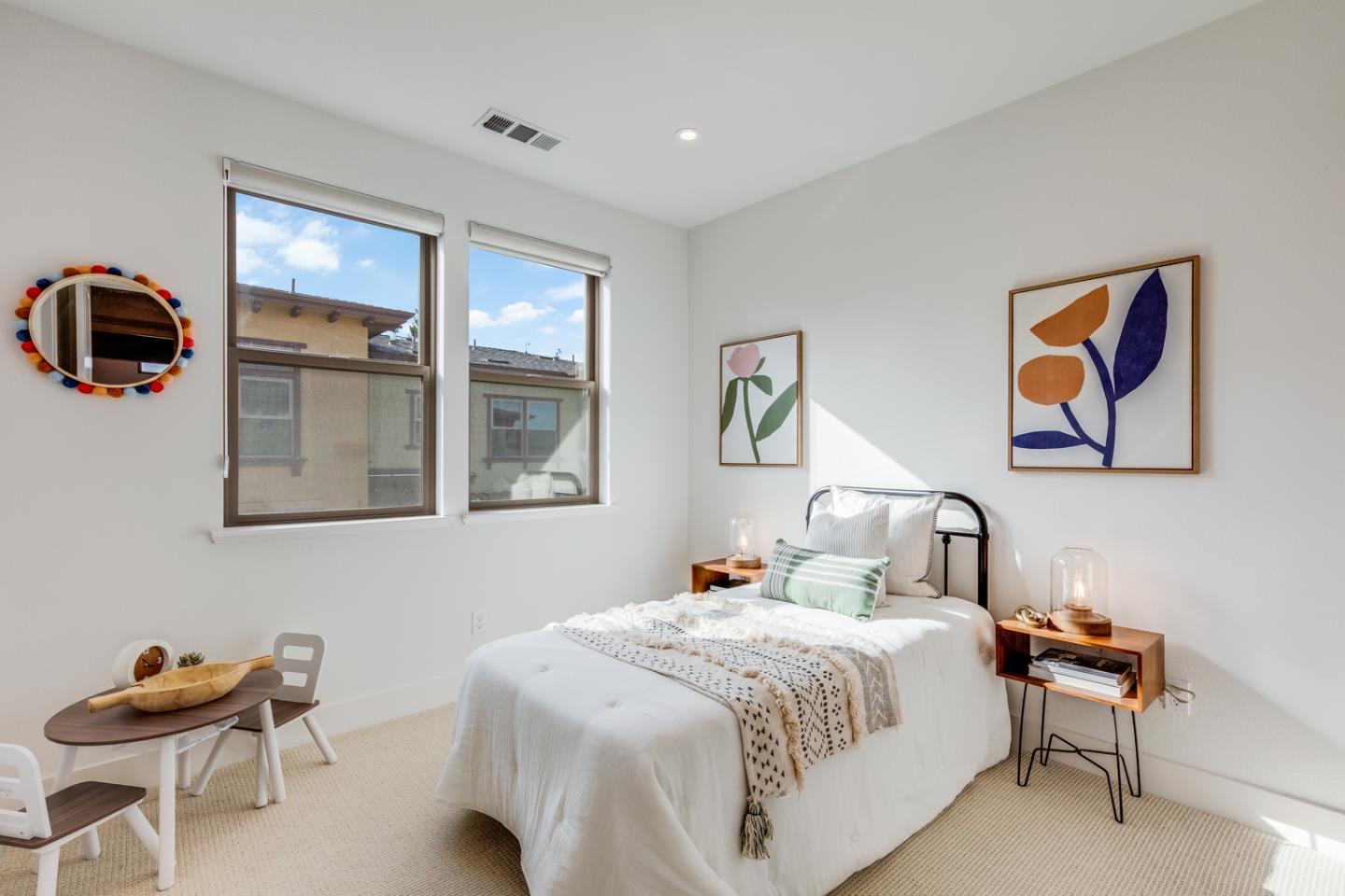 309 Marquetta Circle Mountain View, CA 94043 - Photo 21 of 34 a bedroom with a bed and a window