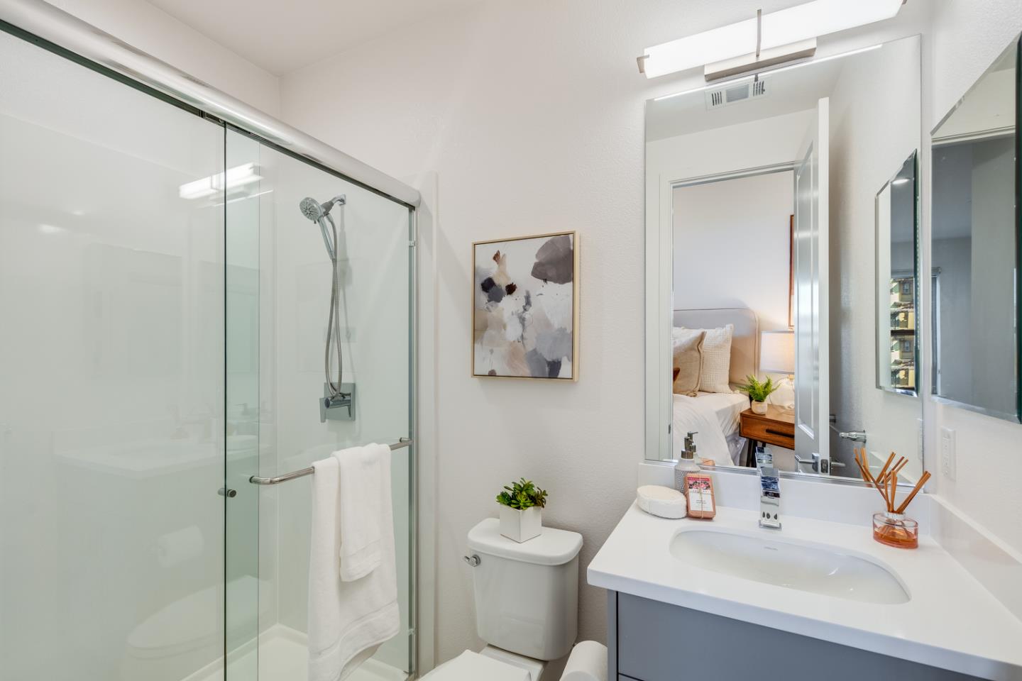 309 Marquetta Circle Mountain View, CA 94043 - Photo 26 of 34 a bathroom with a sink mirror toilet and shower