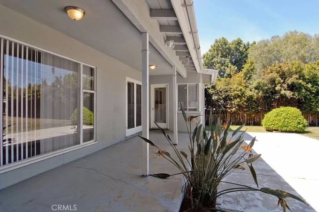 9 L Street Chula Vista, CA 91911 - Photo 1 of 1 a view of a porch with furniture and floor to ceiling window