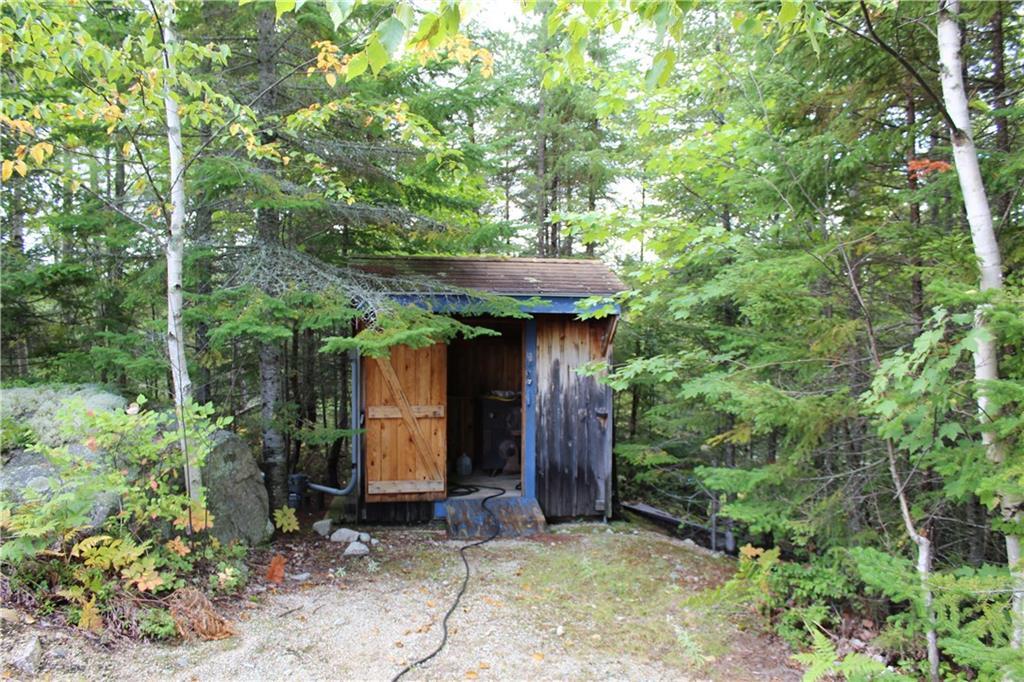 184 Ledge View Road West Forks, ME 04985 - Photo 24 of 49 Generator shed with underground...