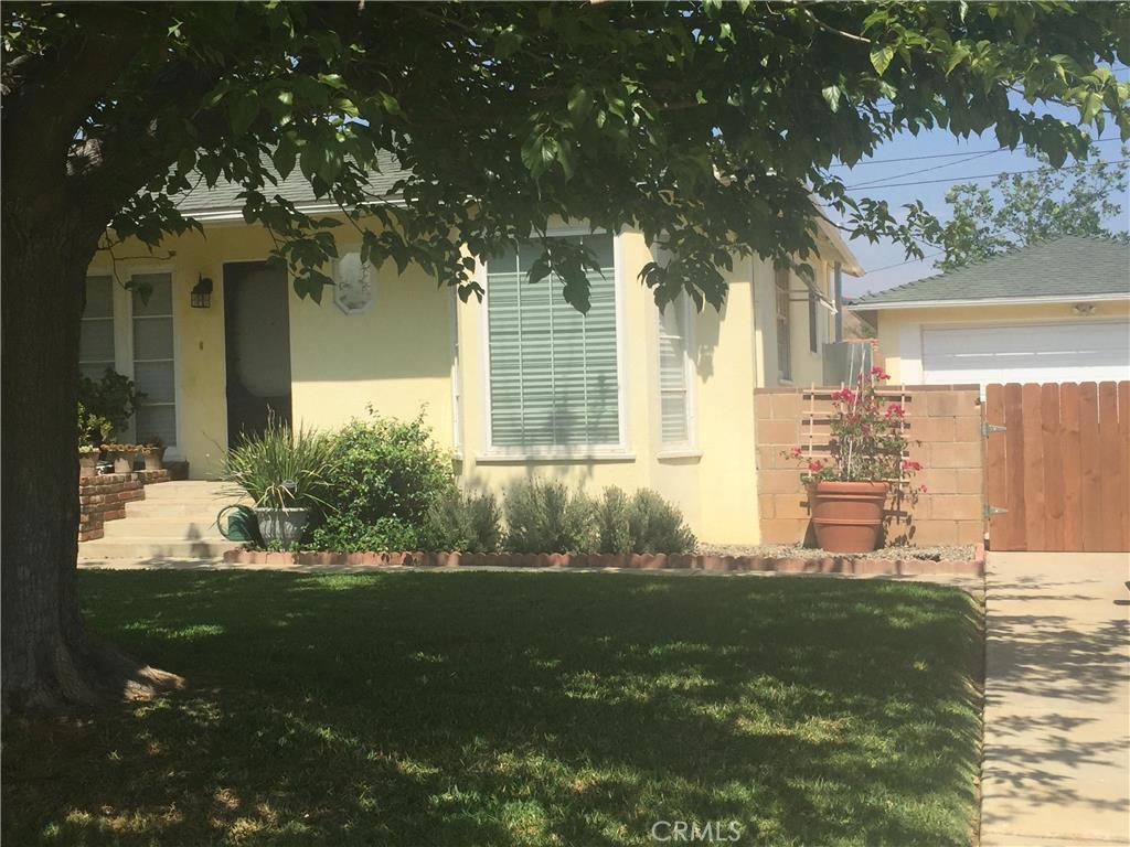 5976 Azurite Street Riverside, CA 92509 - Photo 1 of 1 a view of a house with a yard porch and sitting area