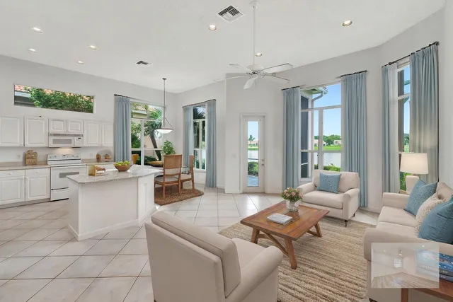 a bathroom with a shower sink and mirror