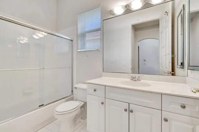 a view of house with garden space and street view