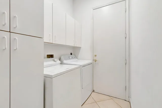 a aerial view of a house with a lake view