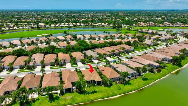 a room with furniture and a large window