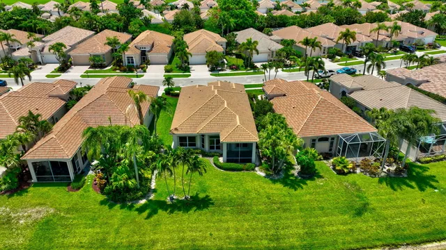 a view of a multi story building with a yard