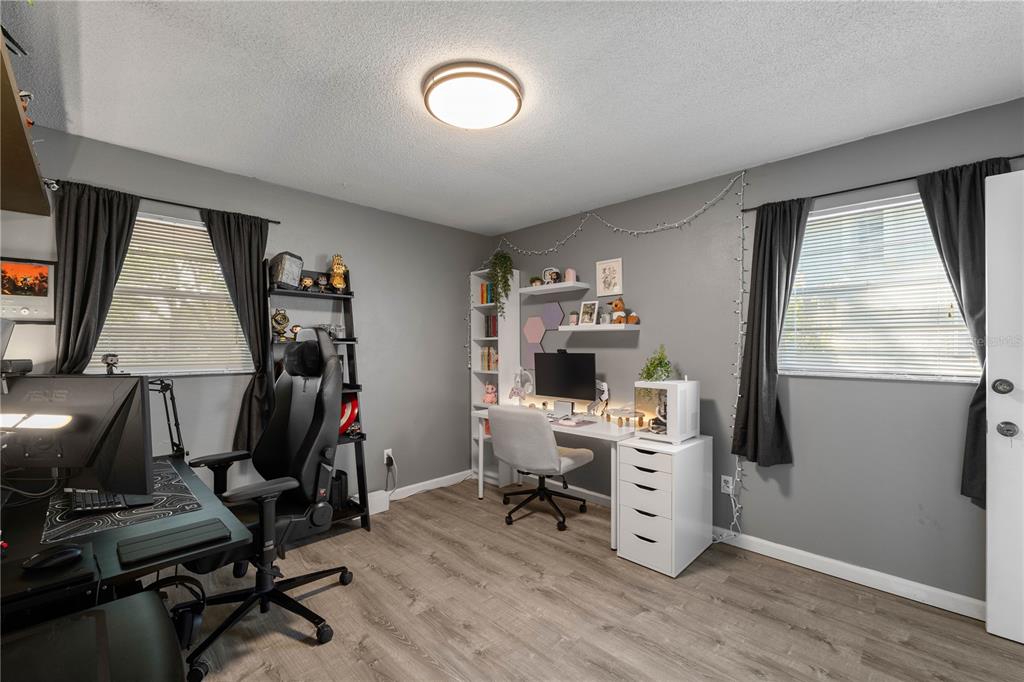 1960 Union Street, Unit 28 Clearwater, FL 33763 - Photo 12 of 23 a view of a workspace with furniture and a window