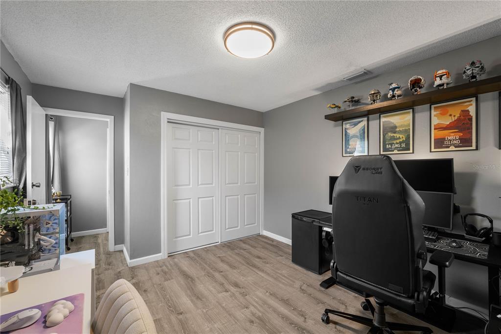 1960 Union Street, Unit 28 Clearwater, FL 33763 - Photo 13 of 23 a room with furniture and window