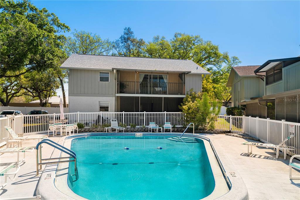 1960 Union Street, Unit 28 Clearwater, FL 33763 - Photo 18 of 23 a view of a house with a backyard