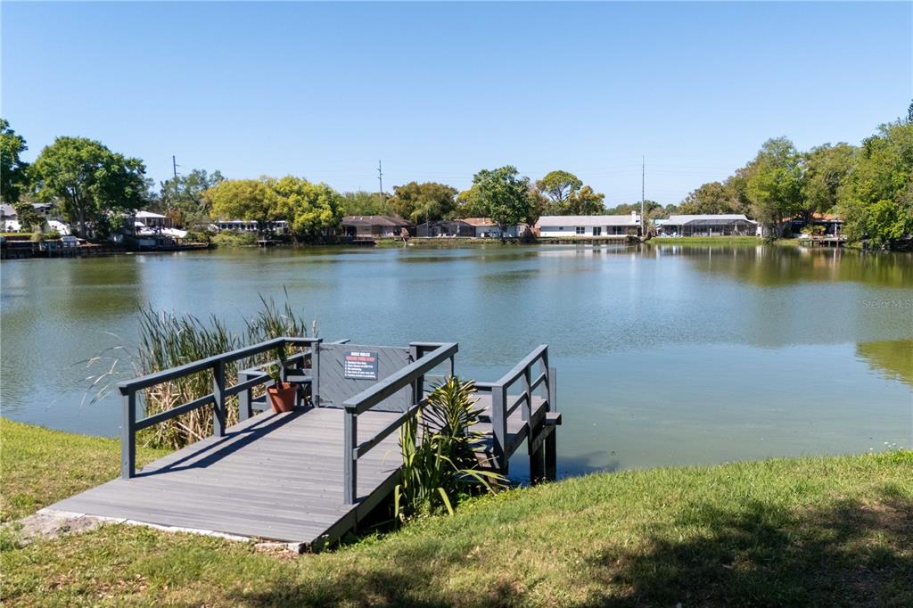 1960 Union Street, Unit 28 Clearwater, FL 33763 - Photo 21 of 23 a view of a lake with houses