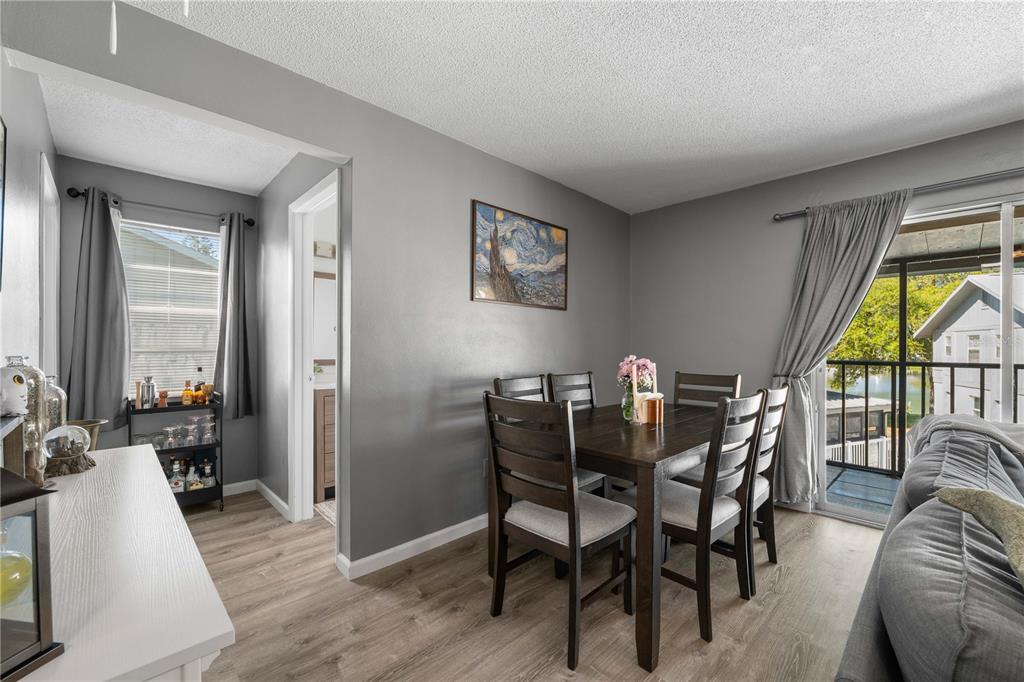 1960 Union Street, Unit 28 Clearwater, FL 33763 - Photo 5 of 23 a view of a dining room with furniture window and wooden floor