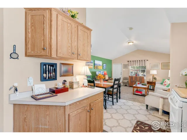 a furniture in a kitchen and a window