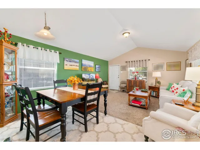 a outdoor dining space with furniture and a potted plant