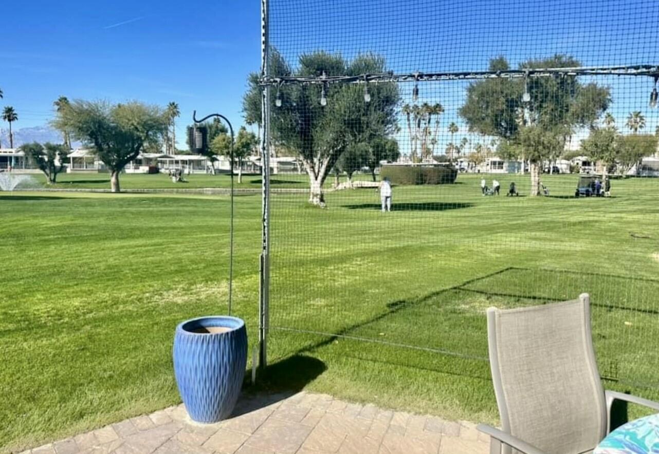 84136 Ave 44, Unit 277 Indio, CA 92203 - Photo 2 of 6 a garden view with a fountain