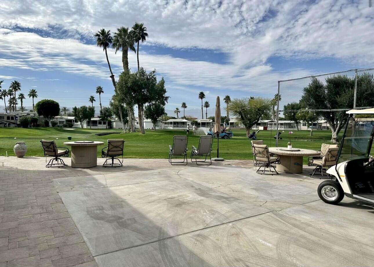 84136 Ave 44, Unit 277 Indio, CA 92203 - Photo 3 of 6 a view of a bench in front of a house