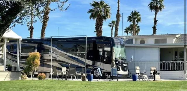 a view of a building with a yard