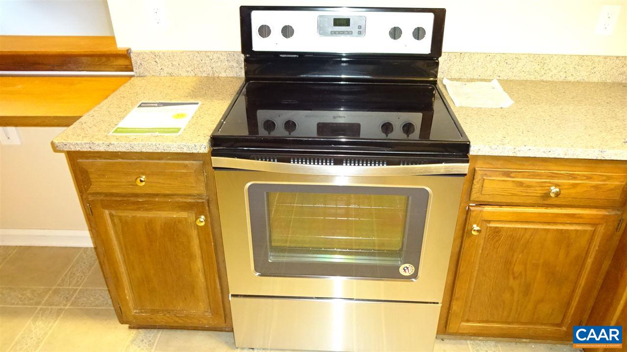 12 Ashton Road Palmyra, VA 22963 - Photo 7 of 25 a view of a stove with wooden floor