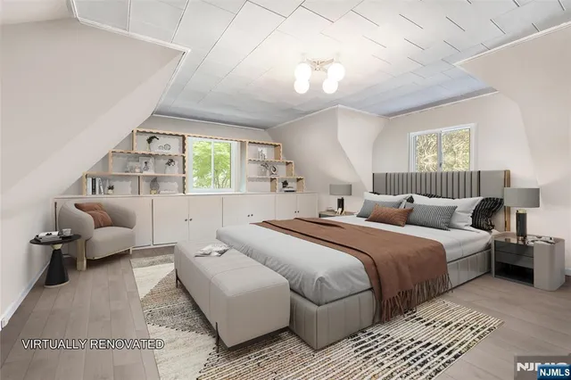 a spacious bedroom with a bed and window