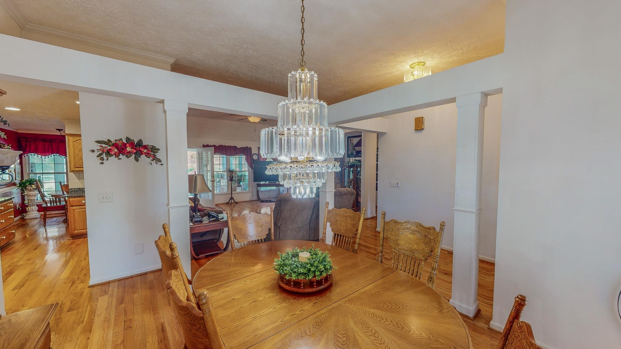 17 Richland Road Roxboro, NC 27574 - Photo 11 of 63 a living room with furniture and a chandelier