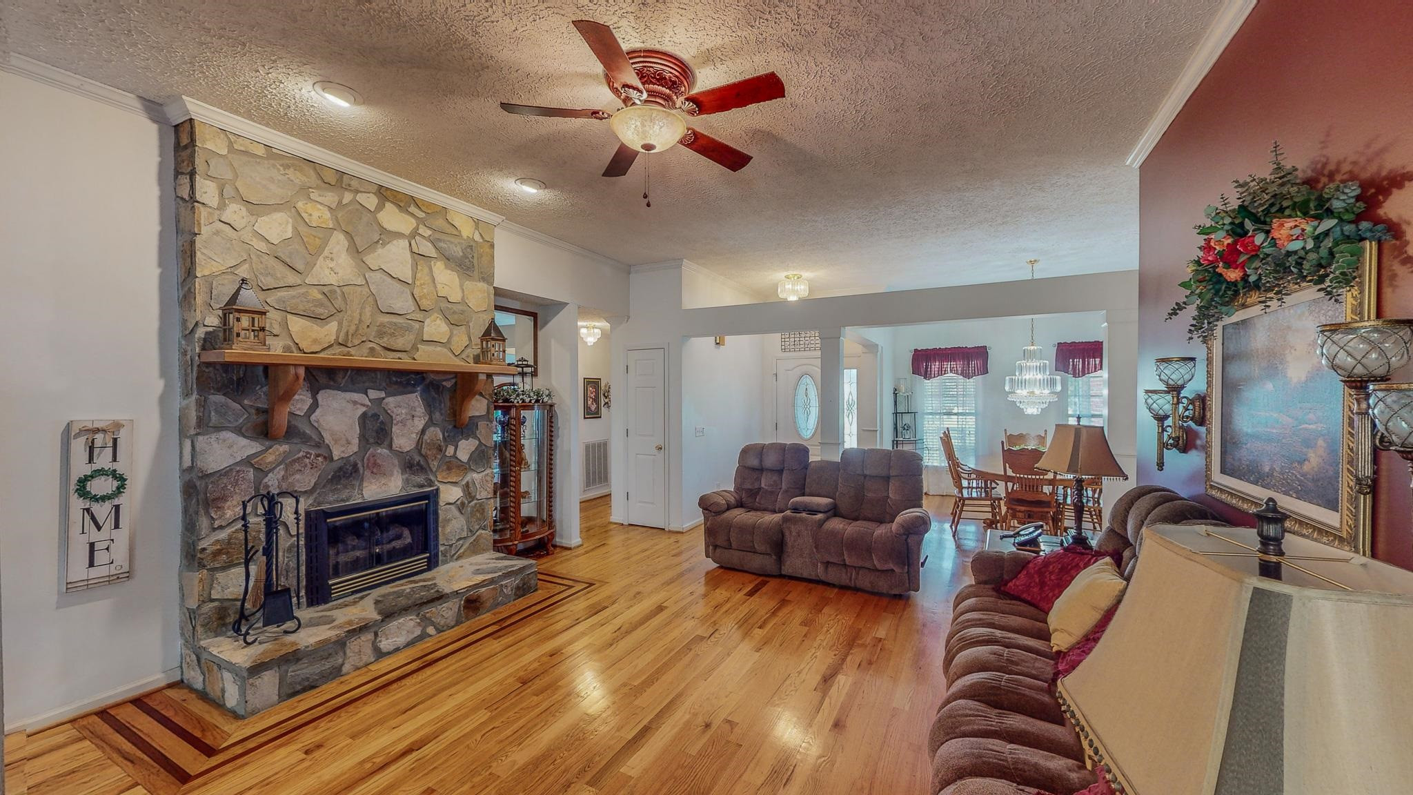17 Richland Road Roxboro, NC 27574 - Photo 2 of 63 a living room with furniture and a fireplace