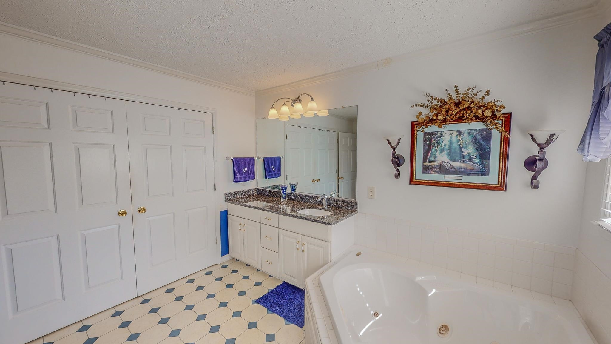 17 Richland Road Roxboro, NC 27574 - Photo 24 of 63 a bathroom with a sink a vanity and a mirror