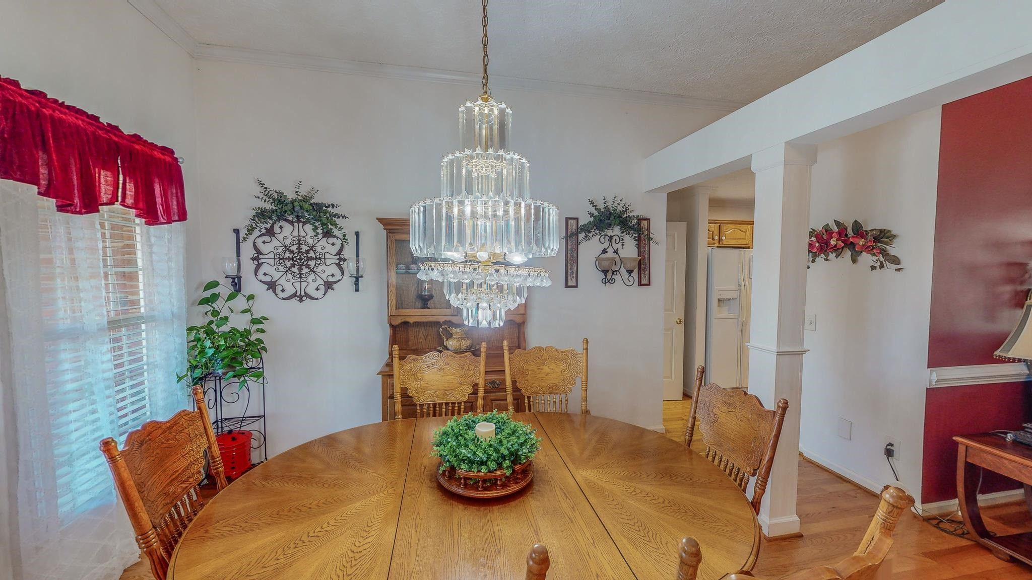17 Richland Road Roxboro, NC 27574 - Photo 26 of 63 a view of a dining room with furniture wooden floor and chandelier