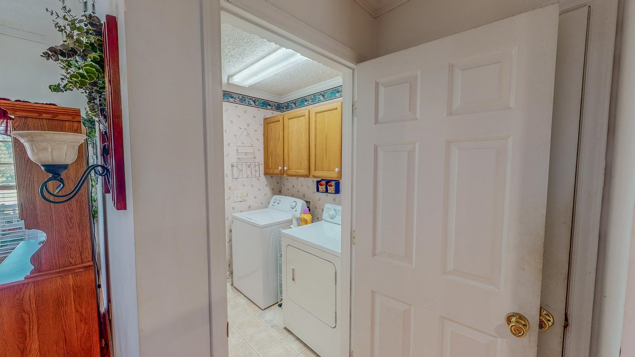 17 Richland Road Roxboro, NC 27574 - Photo 51 of 63 a bathroom with a sink and mirror