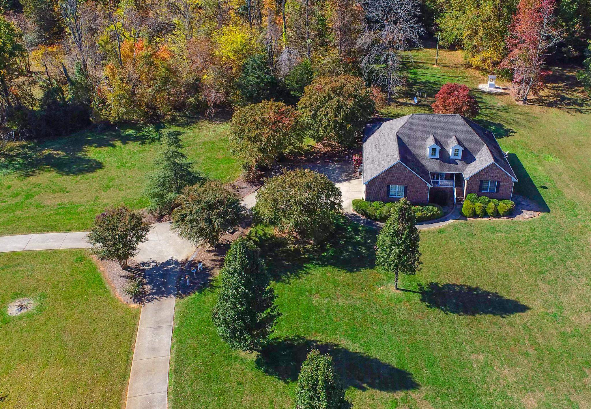 17 Richland Road Roxboro, NC 27574 - Photo 7 of 63 an aerial view of a house with a yard basket ball court and outdoor seating