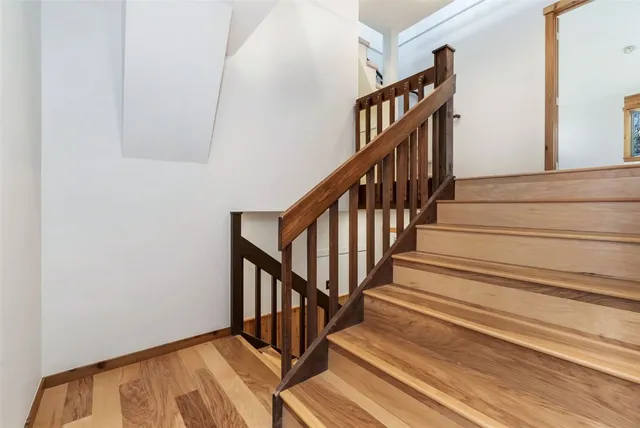 a view of entryway with wooden floor
