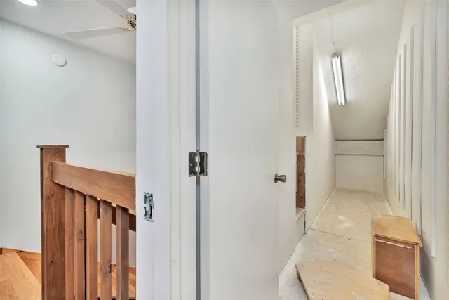 a bathroom with a tub sink and vanity