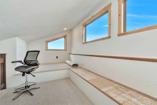 a view of a lake with mountains in the background