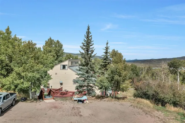 a aerial view of a house with swimming pool