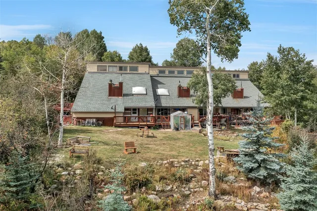 a view of a city and mountains ocean view
