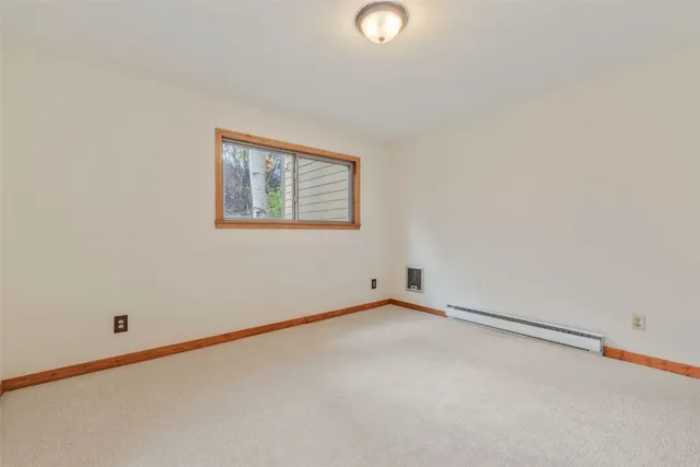 an empty room with sliding door