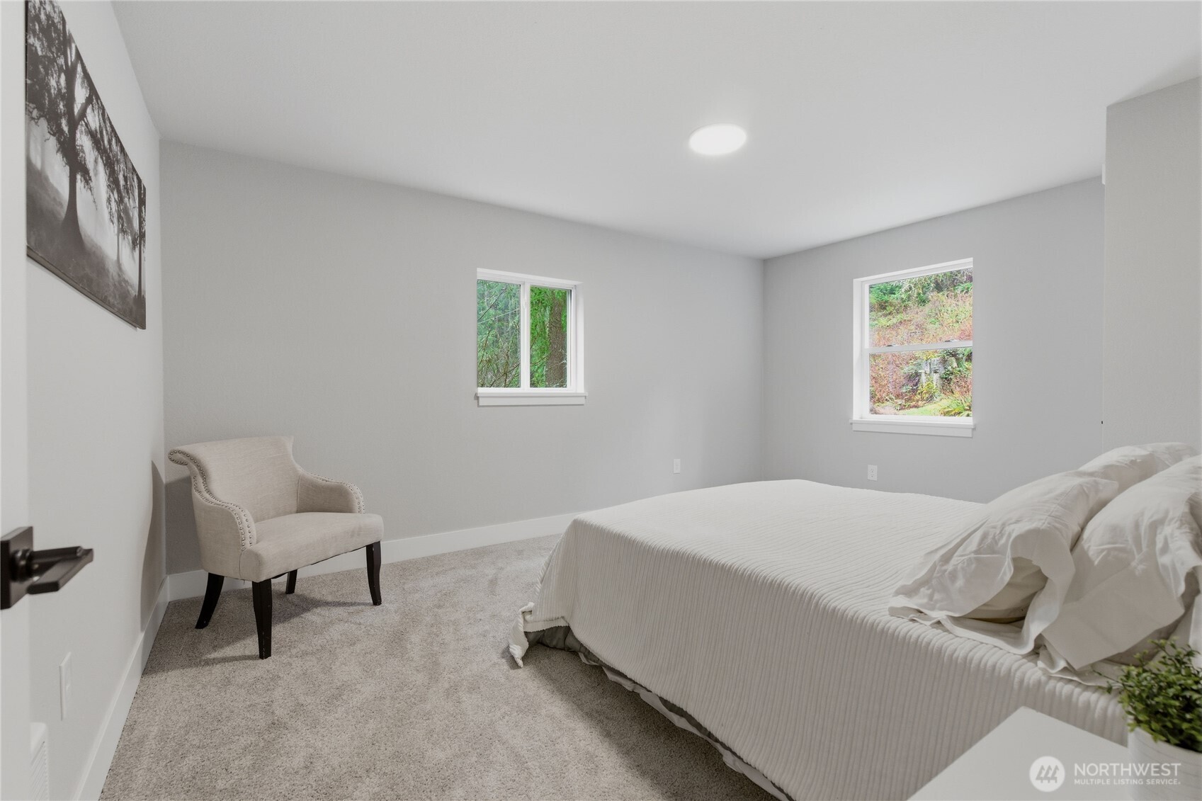 25816 178th Street Southeast Monroe, WA 98272 - Photo 18 of 40 a bedroom with a bed and a chair