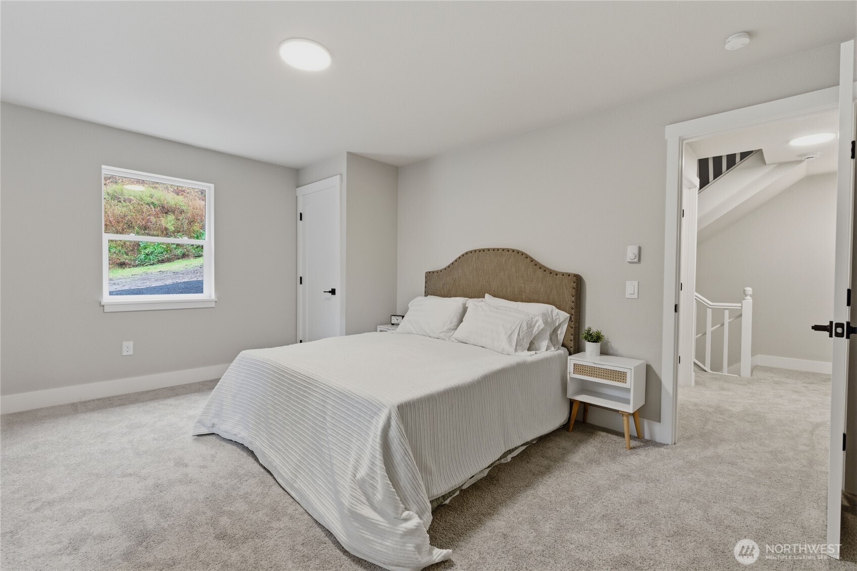 25816 178th Street Southeast Monroe, WA 98272 - Photo 19 of 40 a bedroom with a bed and a window