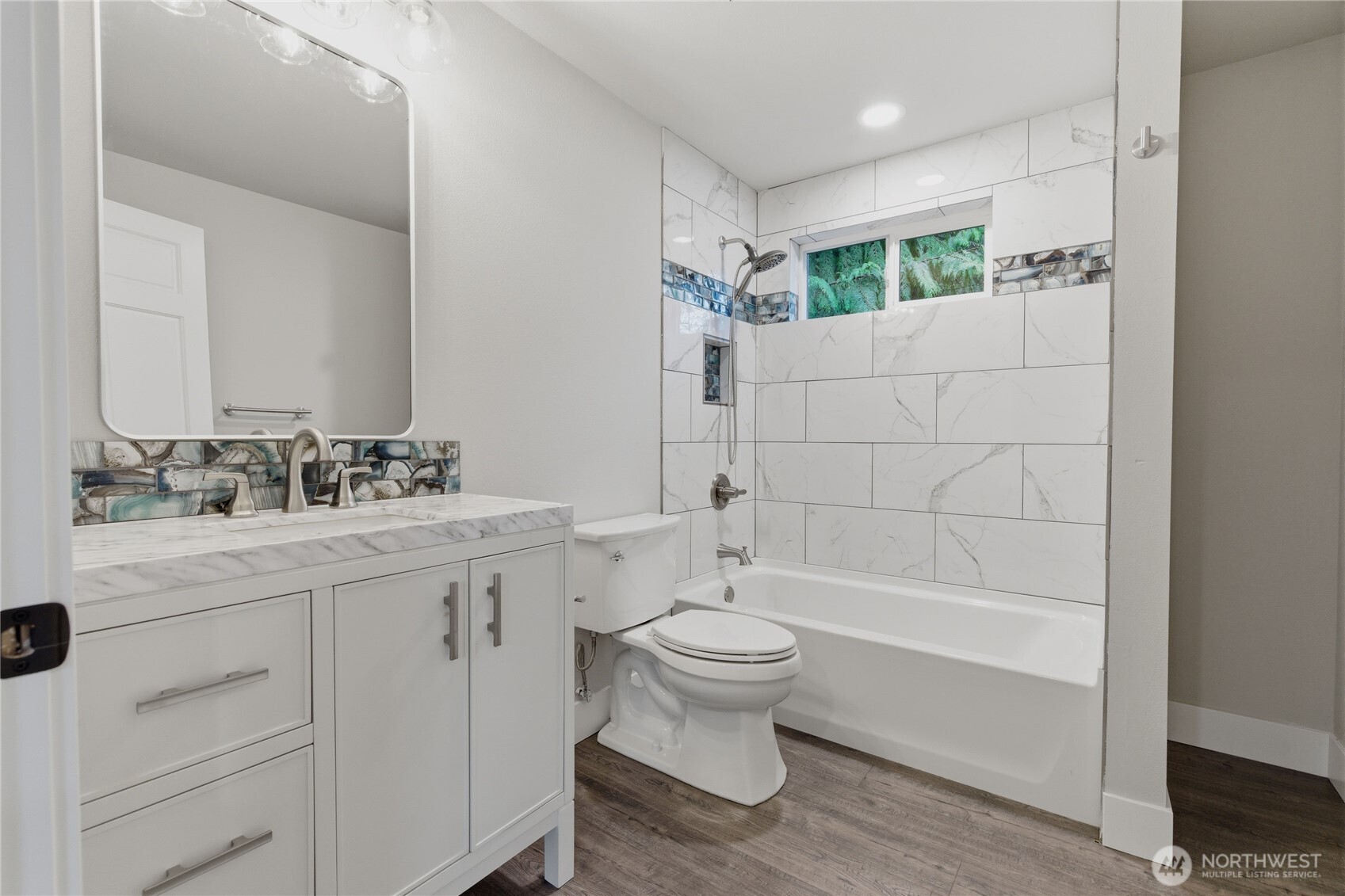25816 178th Street Southeast Monroe, WA 98272 - Photo 31 of 40 a bathroom with a double vanity sink toilet and shower