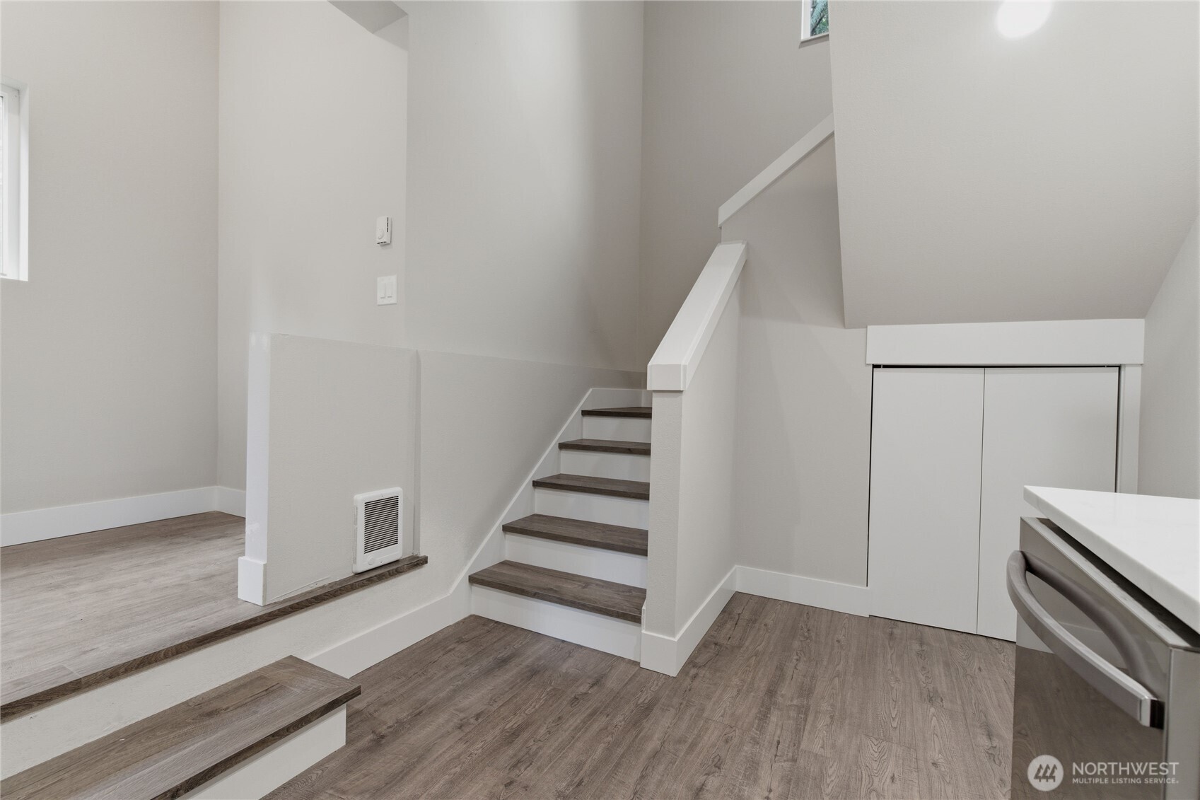 25816 178th Street Southeast Monroe, WA 98272 - Photo 33 of 40 a view of a hallway with staircase and white walls