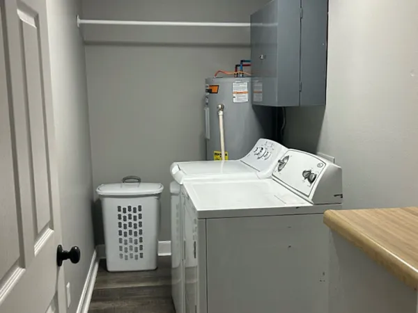 a utility room with dryer and washer