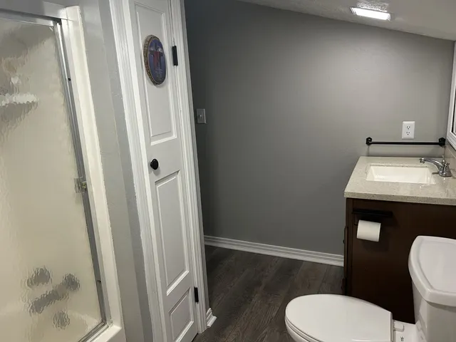 a living room with furniture window and flat screen tv