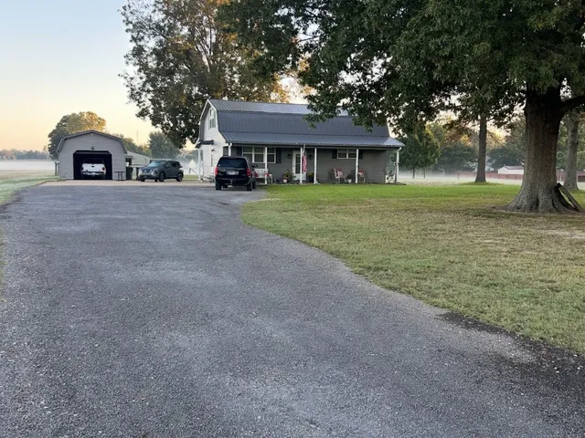 a view of a back yard of the house