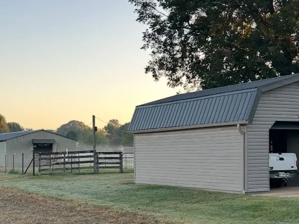 a view of a back yard of the house