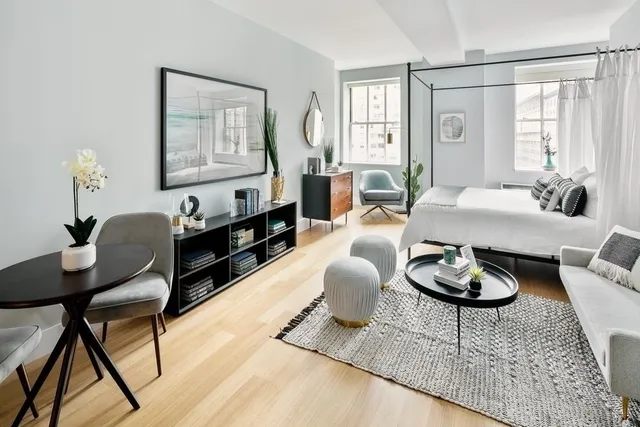 a living room with furniture and a window
