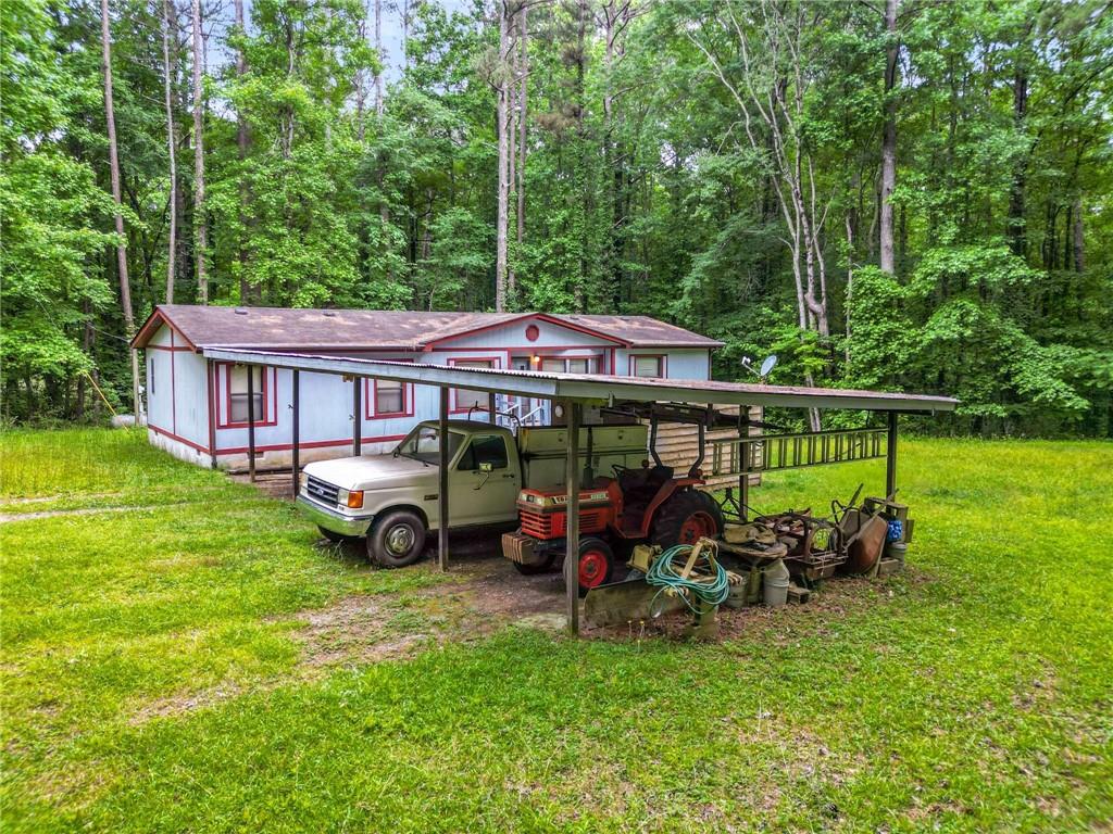 3403 Nebo Road Dallas, GA 30157 - Photo 1 of 1 a view of a house with backyard