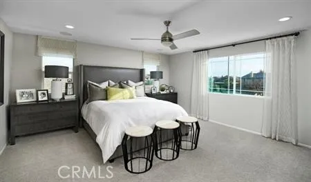 a bed room with a bed and a window