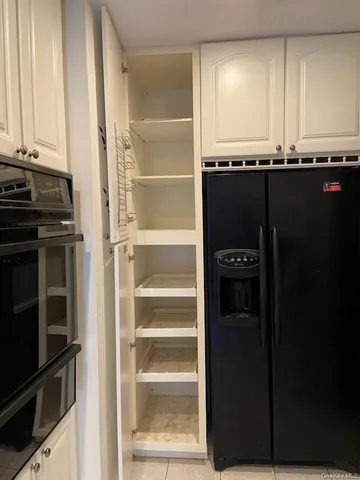 a view of a kitchen with a sink