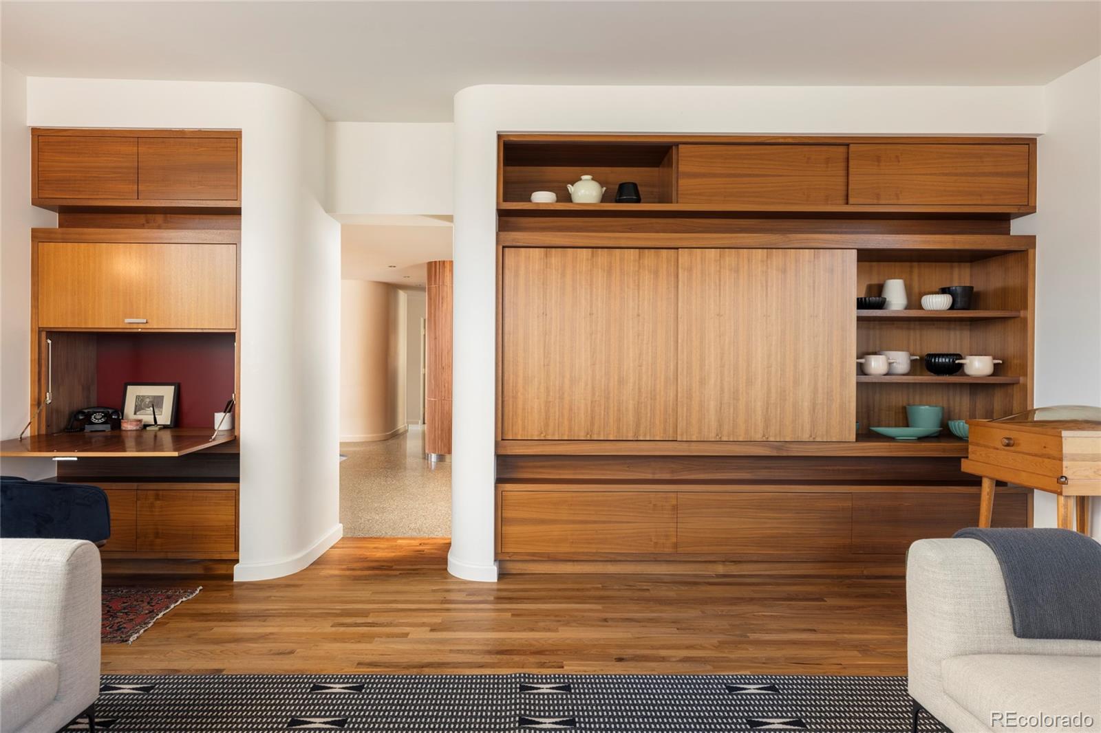 801 South Ellipse Way Denver, CO 80209 - Photo 12 of 50 a view of kitchen with wooden floor and cabinets
