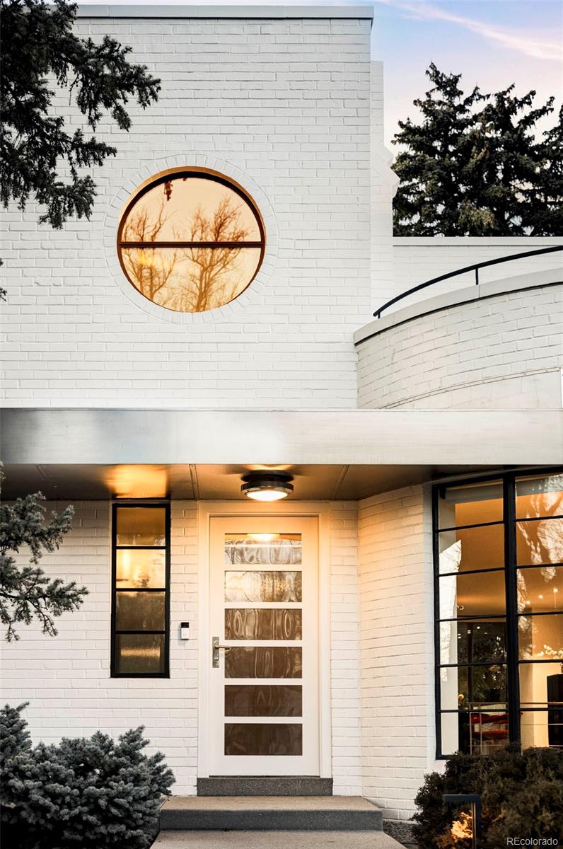 801 South Ellipse Way Denver, CO 80209 - Photo 2 of 50 a view of a entryway door of the house and window