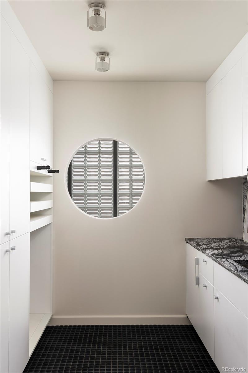 801 South Ellipse Way Denver, CO 80209 - Photo 27 of 50 a view of an empty room with a window